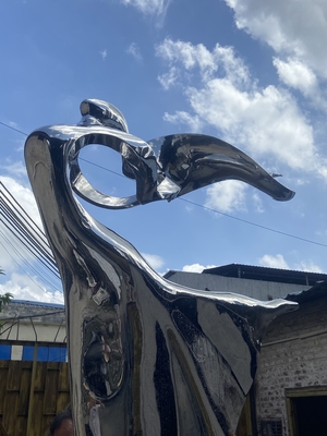 Outdoor garden courtyard decorated with stainless steel abstract sculpture dancing girl