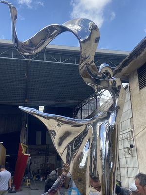 Outdoor garden courtyard decorated with stainless steel abstract sculpture dancing girl