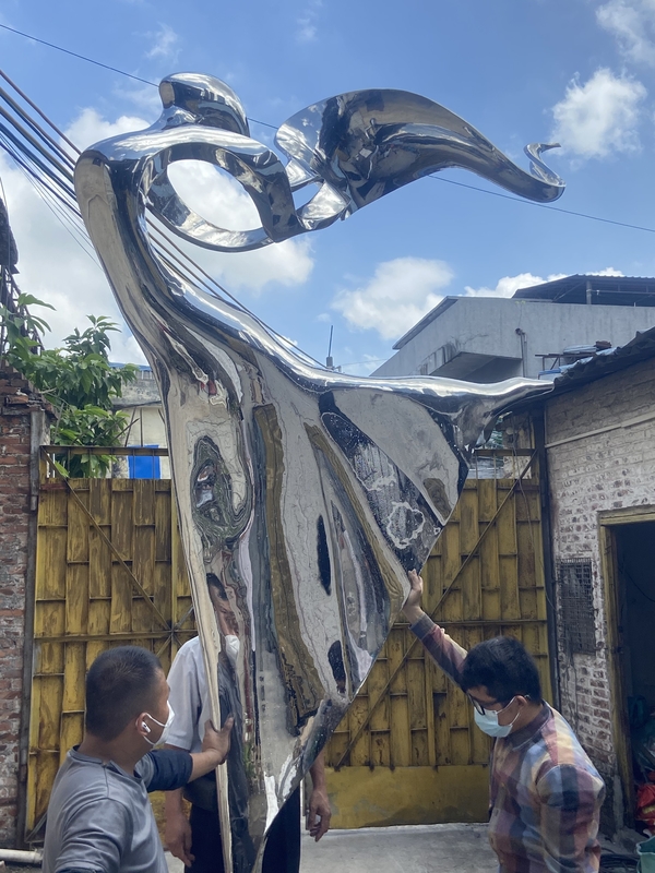 Outdoor garden courtyard decorated with stainless steel abstract sculpture dancing girl